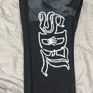 Stylish Black Pants with White Graphic